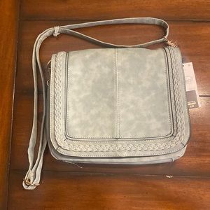 Off the shoulder purse, color lighter blue